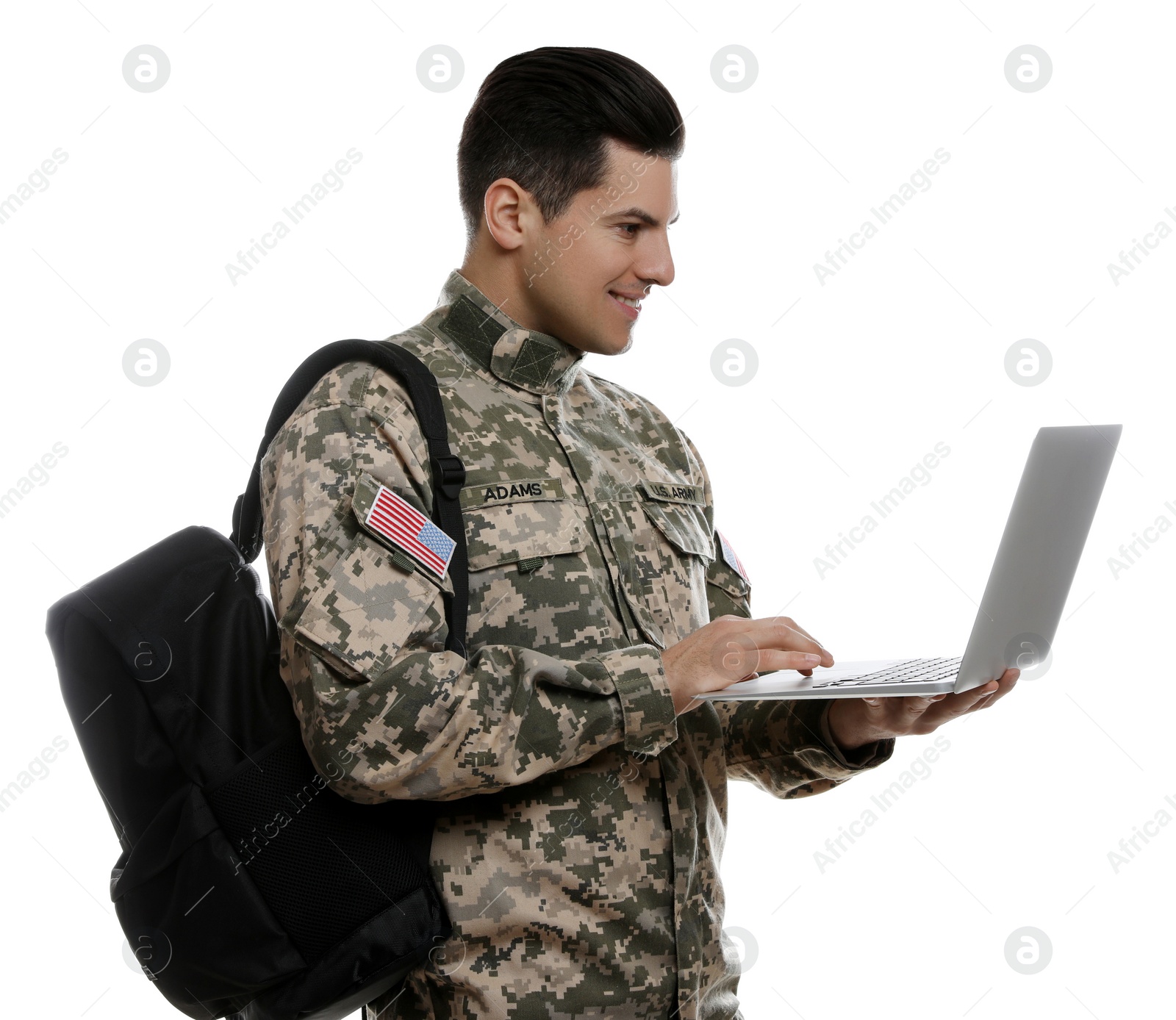 Photo of Cadet with backpack and laptop isolated on white. Military education