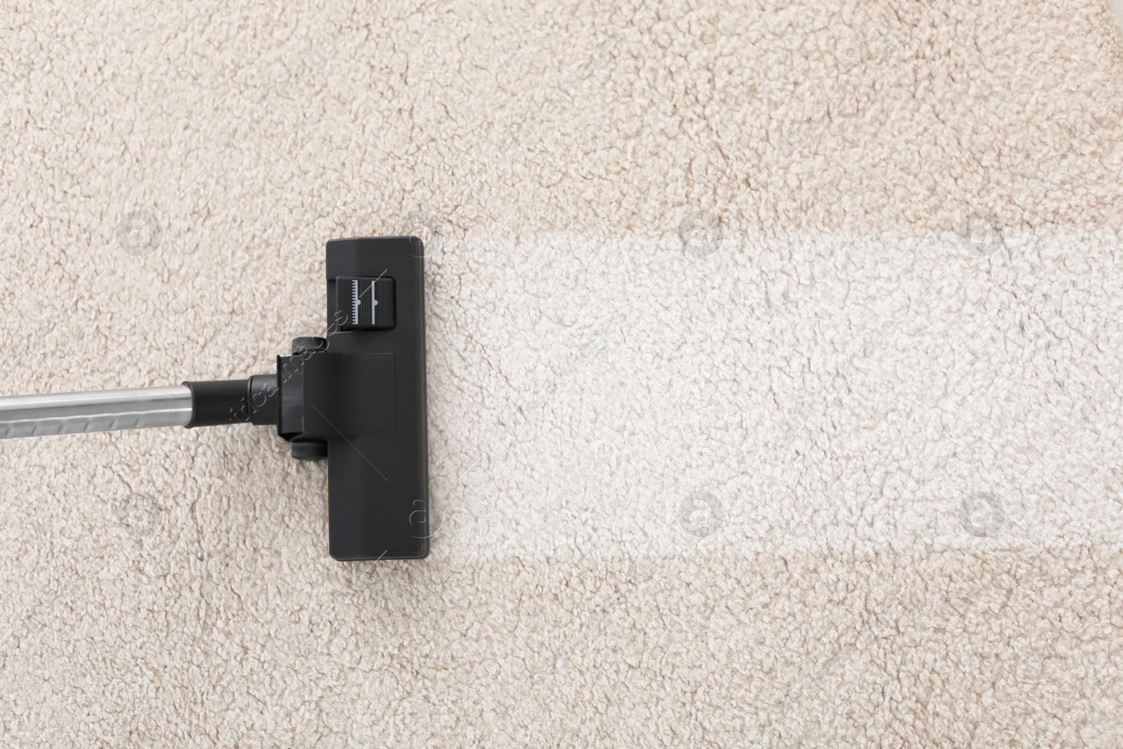 Photo of Vacuum cleaner on carpet