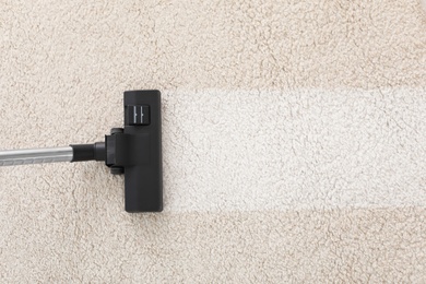 Vacuum cleaner on carpet