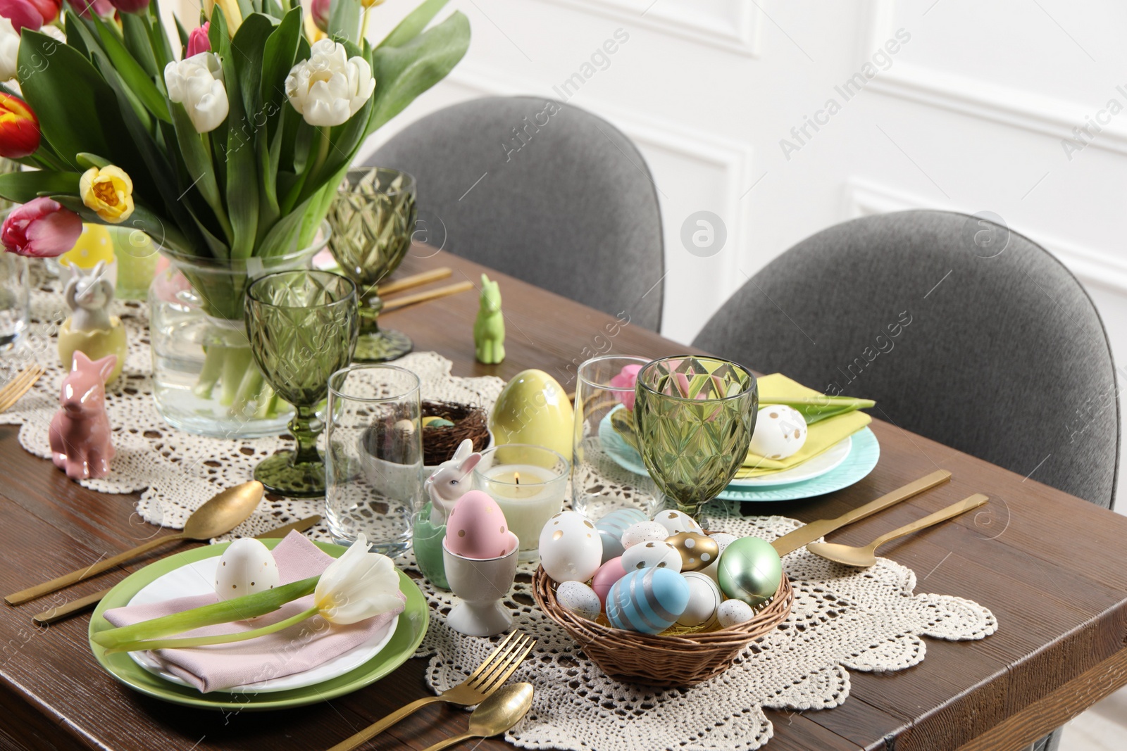 Photo of Festive table setting with beautiful flowers. Easter celebration