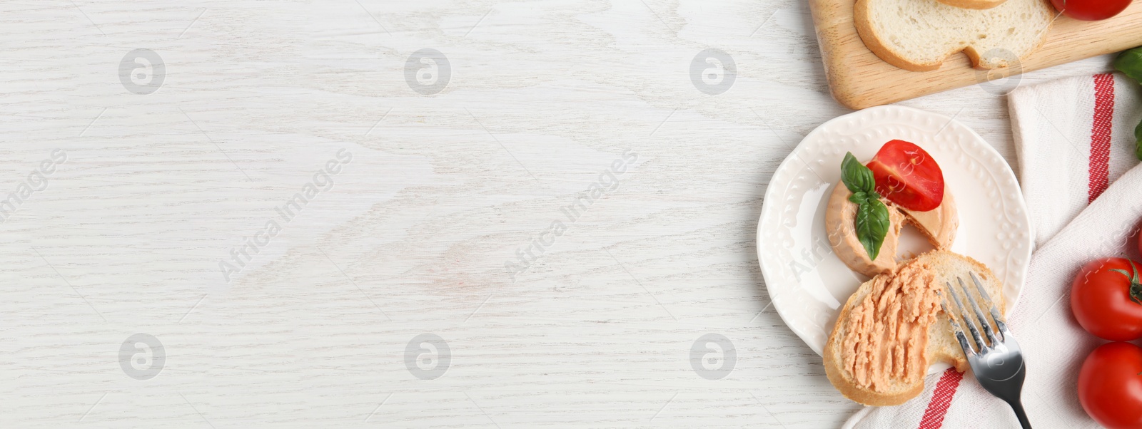 Image of Delicious pate and slices of bread served on white wooden table, flat lay. Banner design with space for text