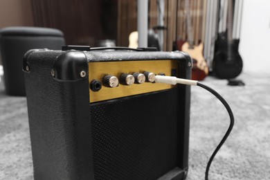 Photo of Guitar amplifier at recording studio, closeup. Music band practice