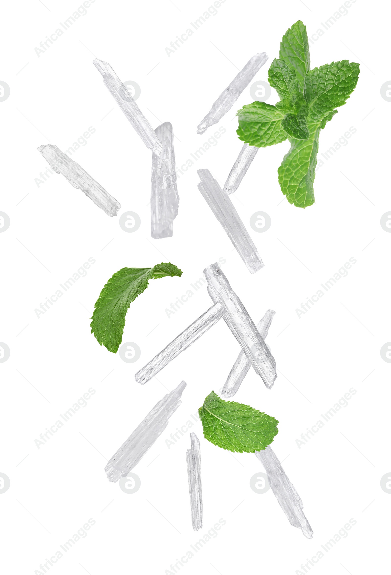 Image of Translucent menthol crystals and green mint leaves falling on white background 