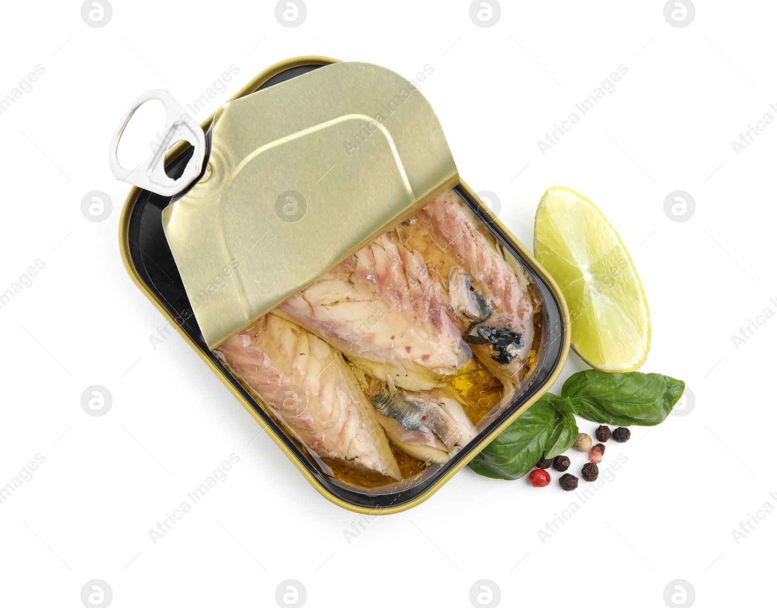 Photo of Open tin can with mackerel fillets, lime, peppercorns and basil on white background, top view