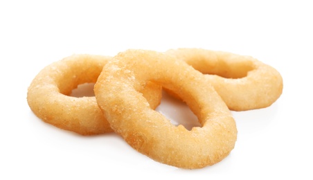 Freshly cooked onion rings on white background