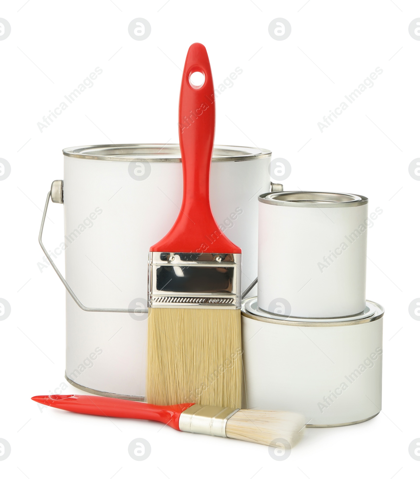 Photo of Paint cans and brushes on white background