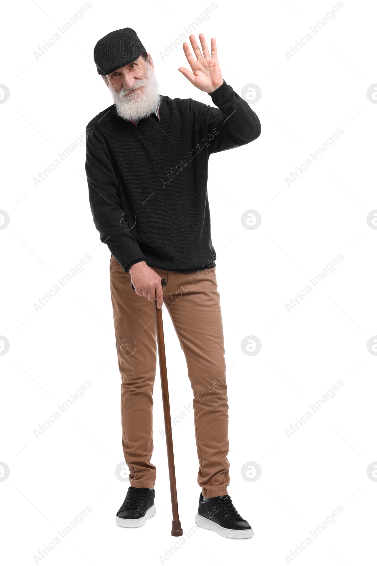 Photo of Senior man with walking cane waving on white background