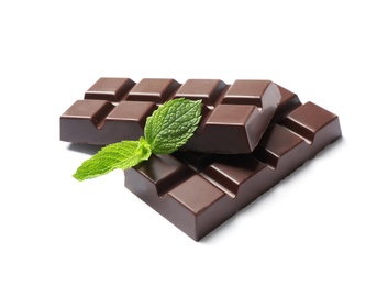 Pieces of dark chocolate with mint on white background