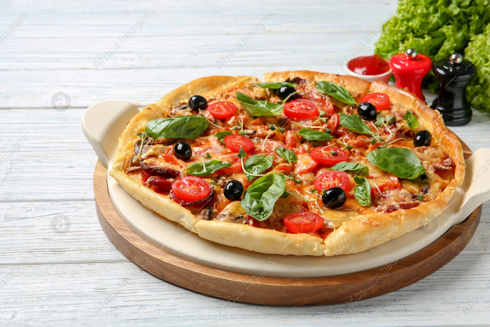 Photo of Tasty fresh homemade pizza on wooden table