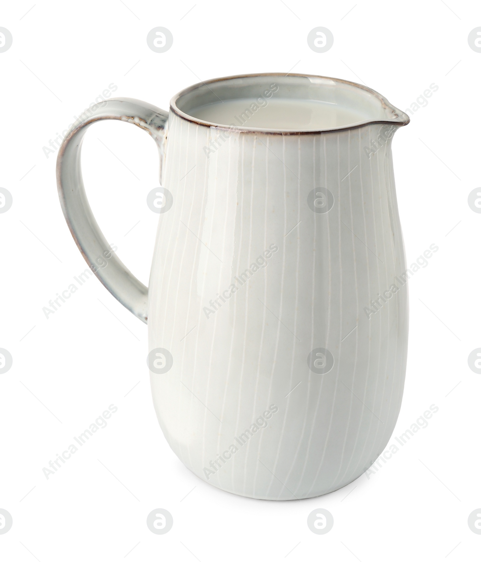 Photo of One jug full of fresh milk isolated on white