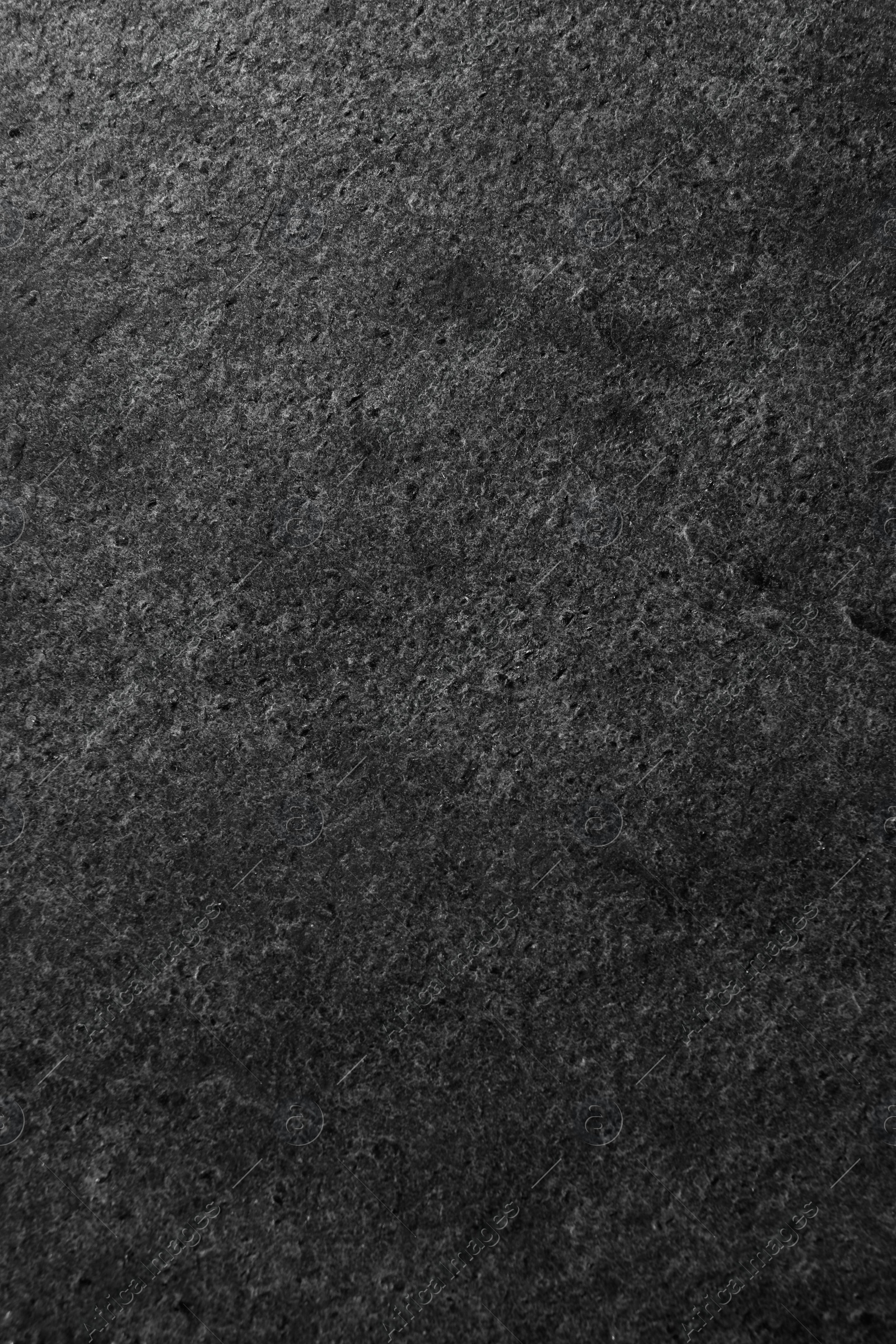 Image of Texture of dark grey stone surface as background, closeup