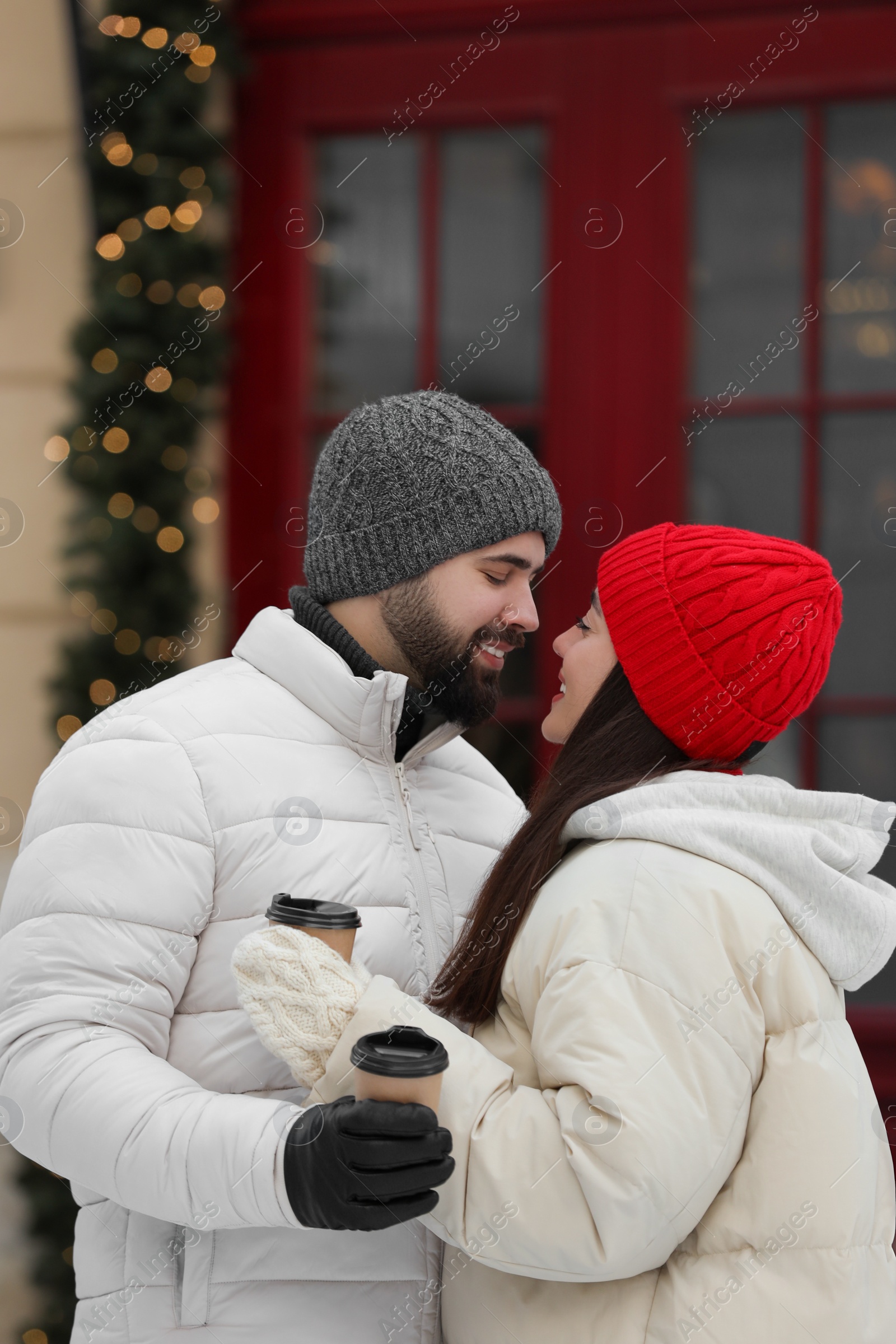 Photo of Lovely couple spending time together on city street