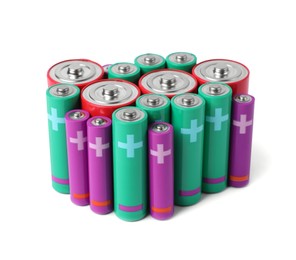 Photo of Many different new batteries isolated on white