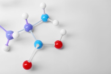 Photo of Molecule of phenylalanine on white background, closeup. Chemical model