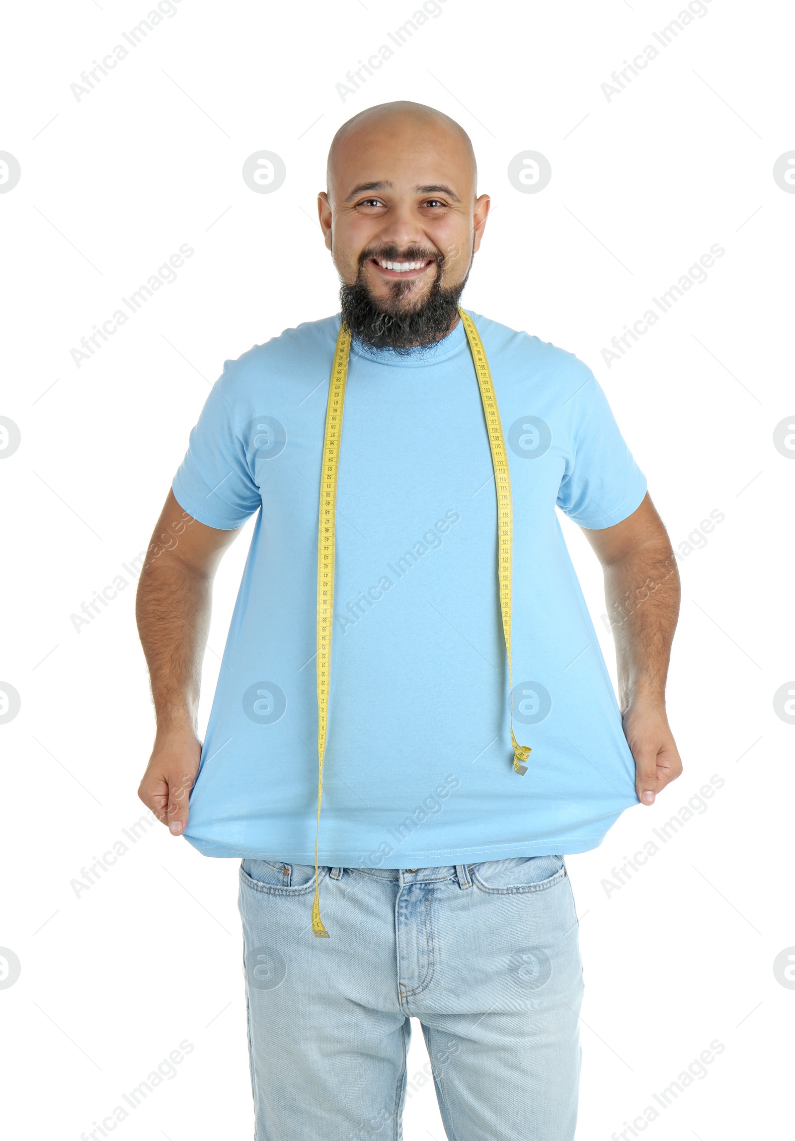 Photo of Overweight man with measuring tape on white background