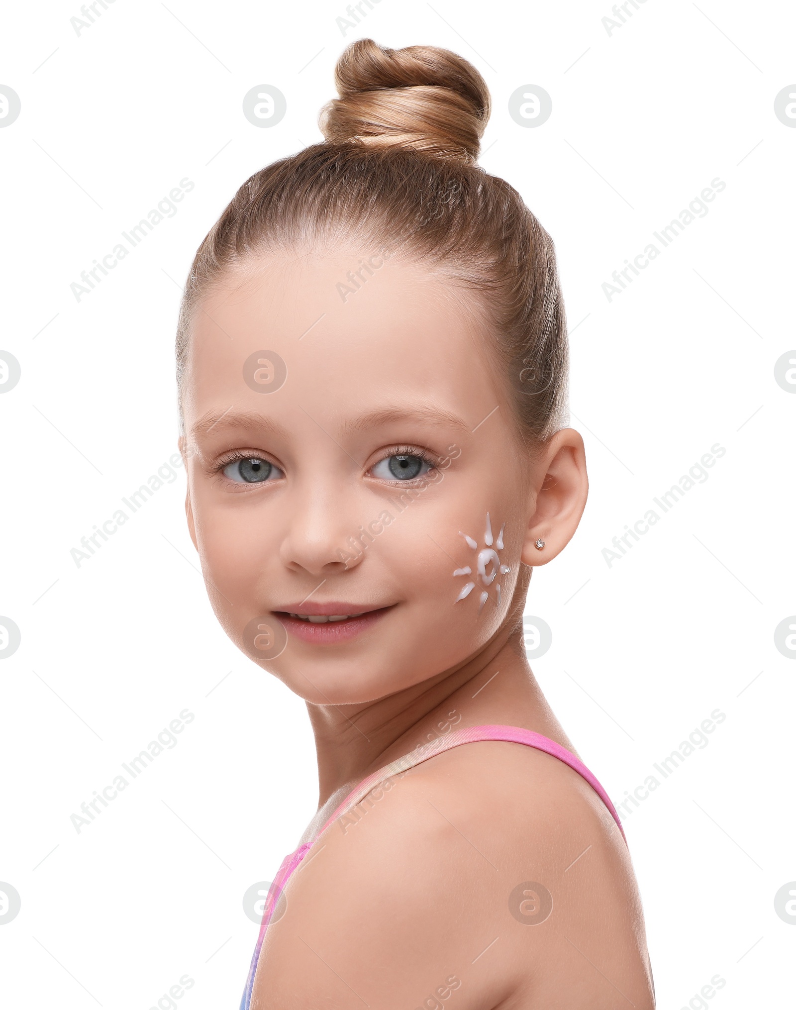 Photo of Happy girl with sun protection cream on her face isolated on white