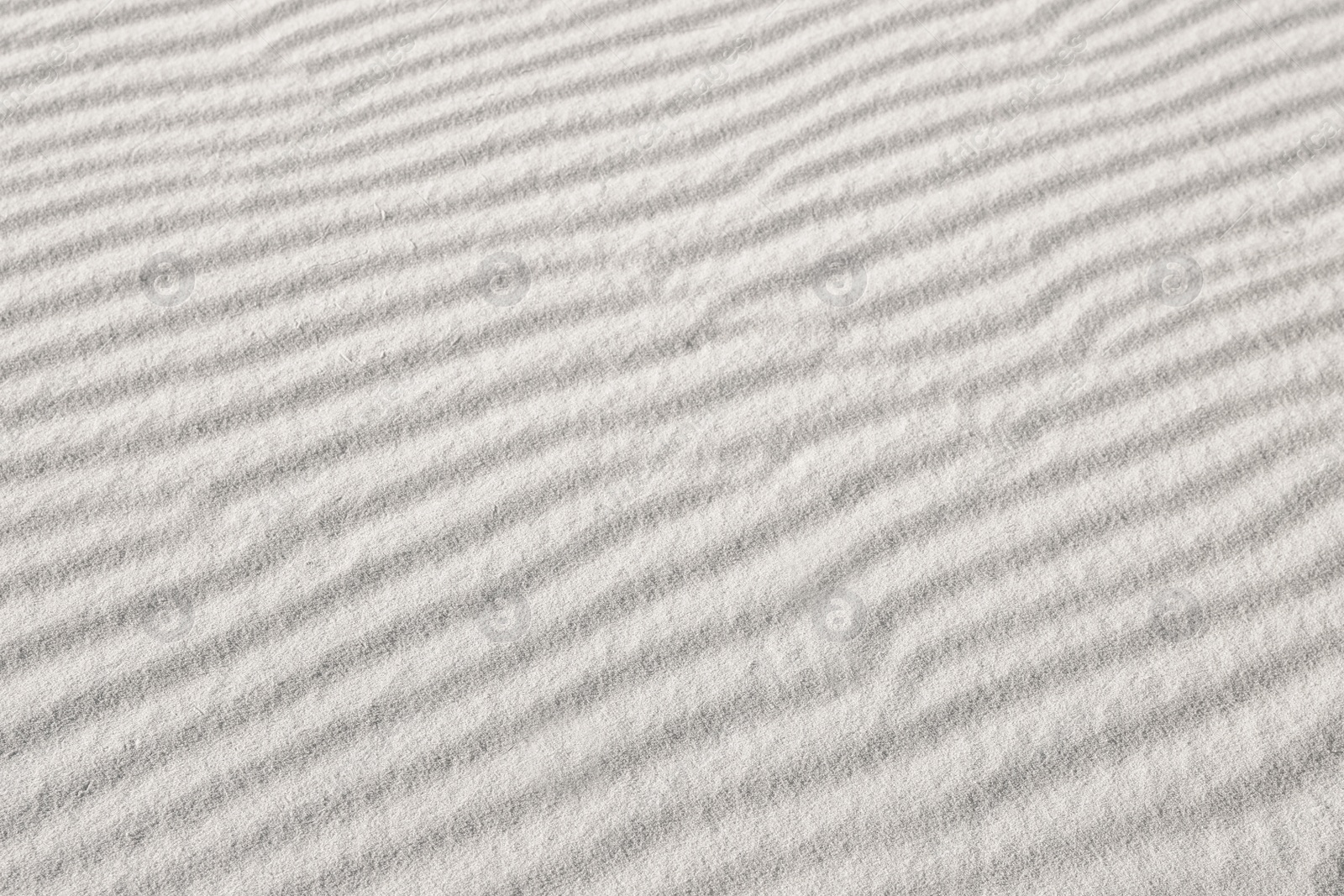 Image of Dry beach sand as background, closeup view