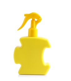 Bottle with sun protection body cream on white background