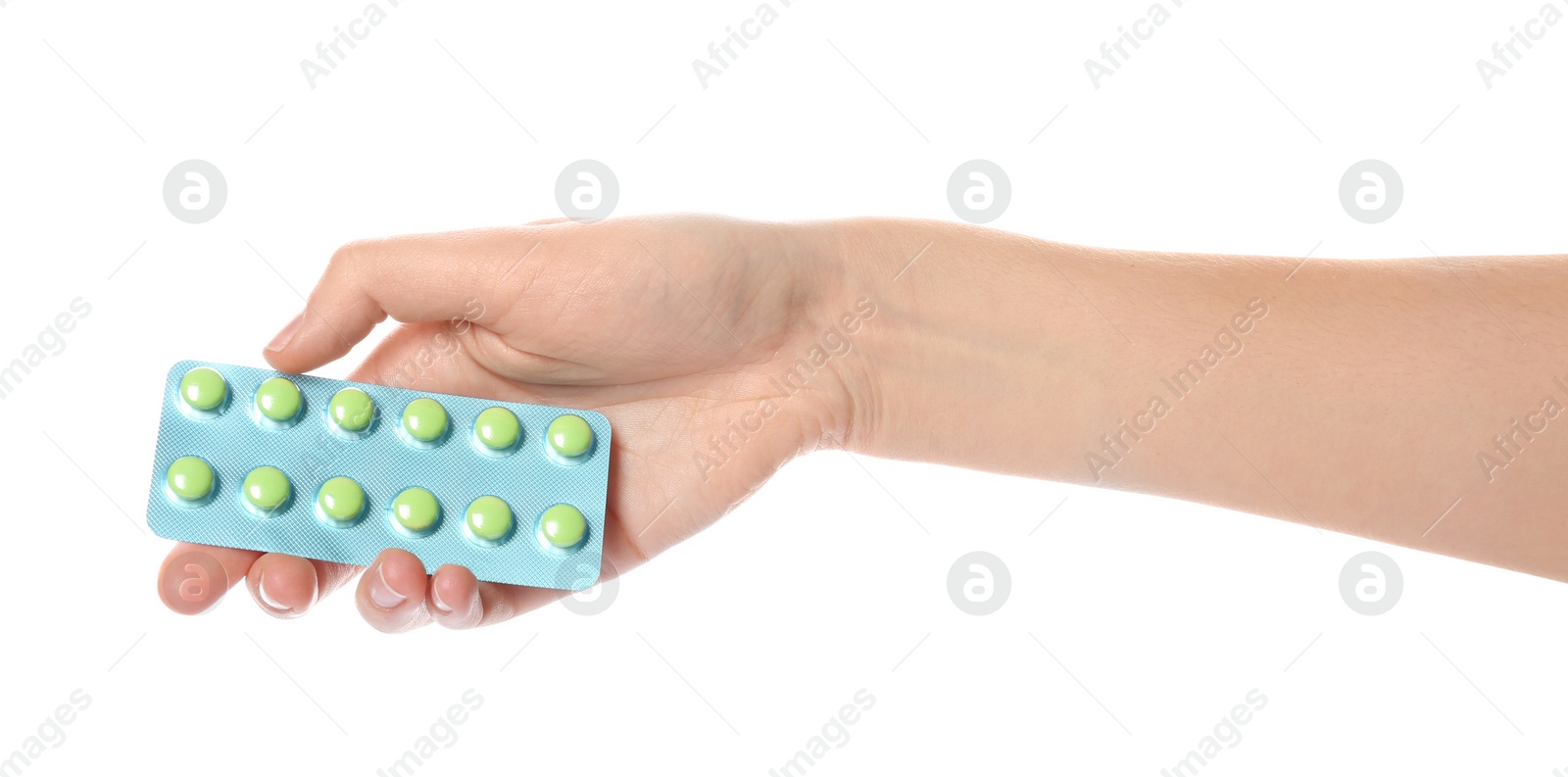 Photo of Woman holding pills in blister pack on white background, closeup