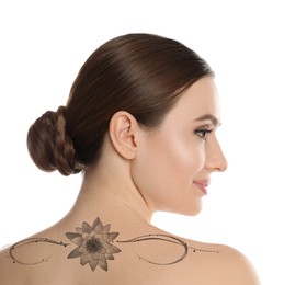 Image of Smiling young woman with beautiful flower tattoo on white background, back view