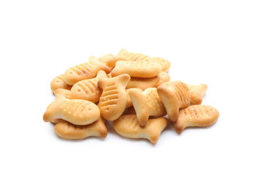 Photo of Delicious crispy goldfish crackers on white background