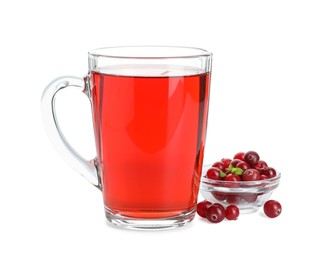 Cup of delicious cranberry tea and berries isolated on white