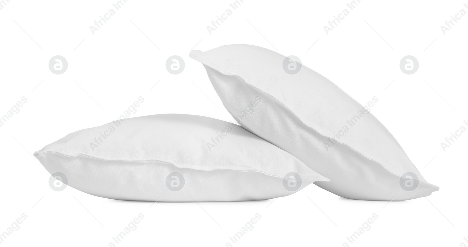 Photo of Two new soft pillows isolated on white