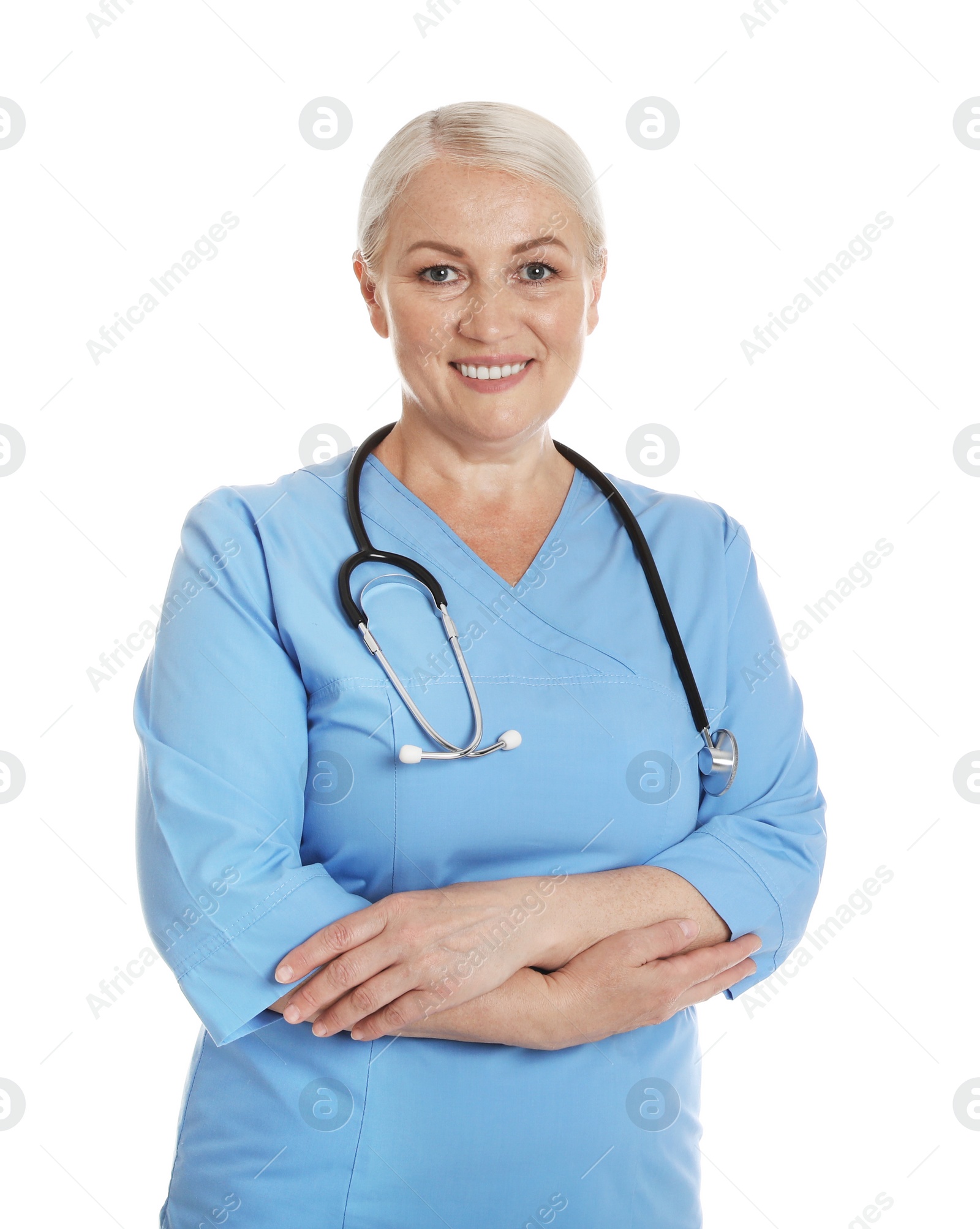 Photo of Portrait of female doctor in scrubs isolated on white. Medical staff