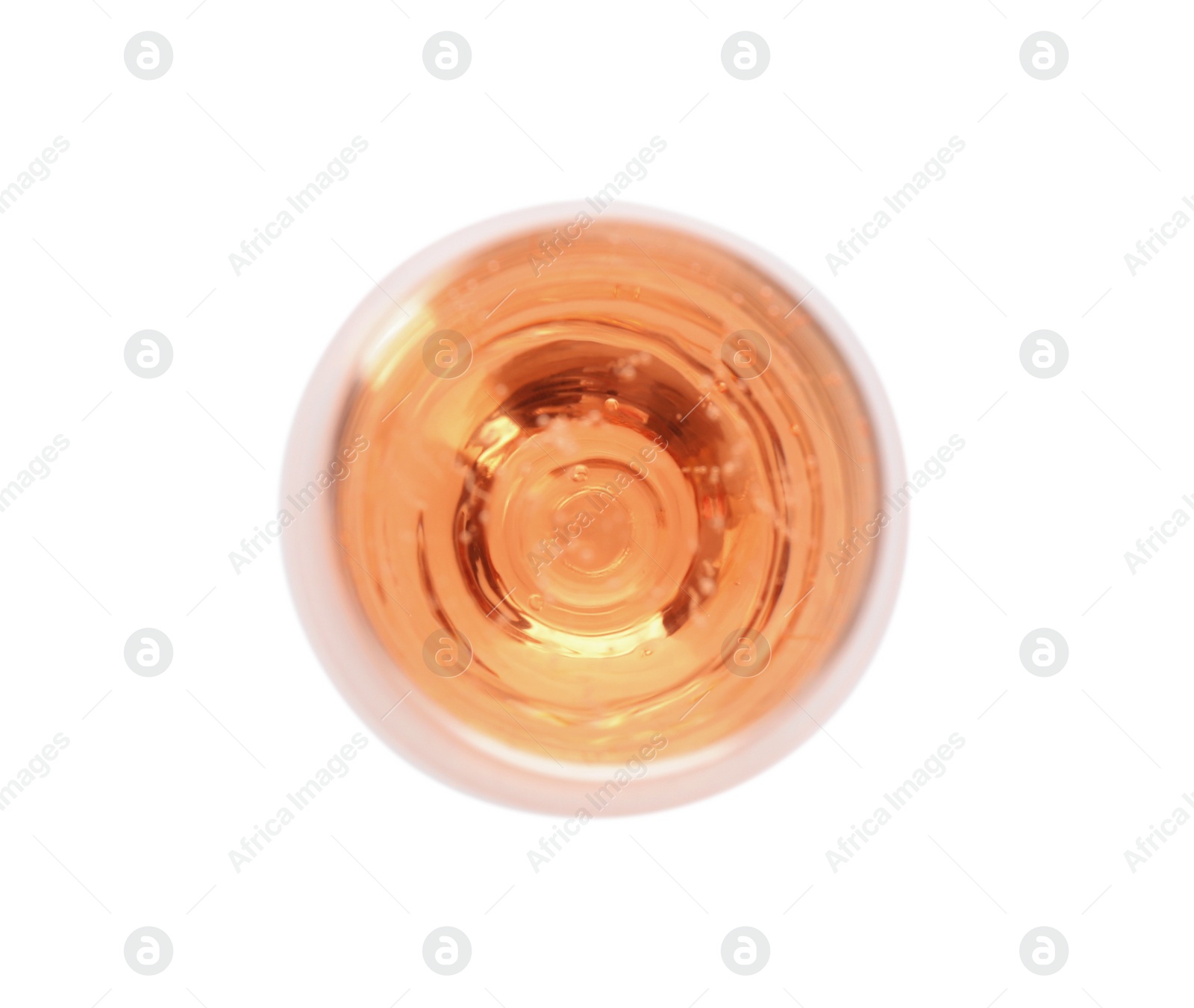 Photo of Glass of rose champagne on white background, top view