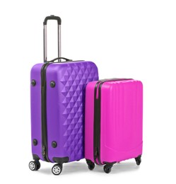 Image of Packed stylish suitcases on white background. Traveler's luggage