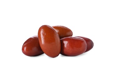 Heap of ripe red dates on white background