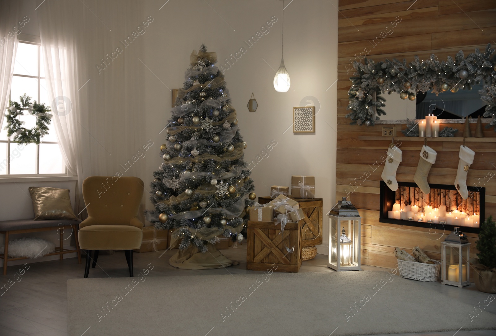 Photo of Festive interior with beautiful Christmas tree and gifts