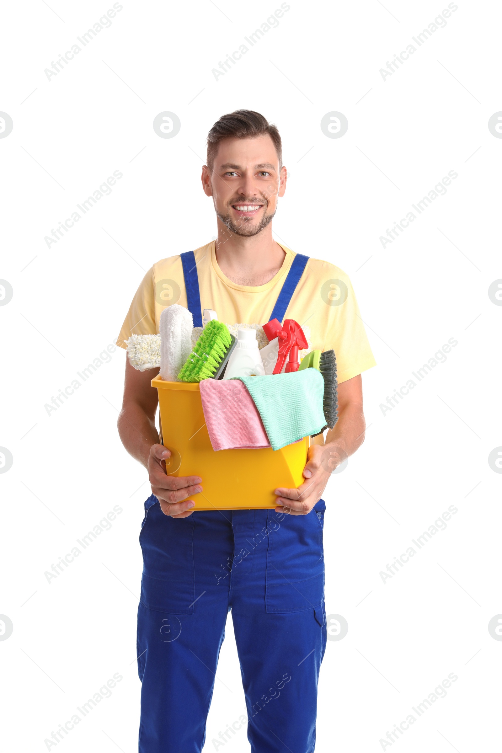 Photo of Male janitor with cleaning supplies on white background