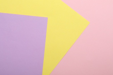 Photo of Colorful paper sheets as background, top view