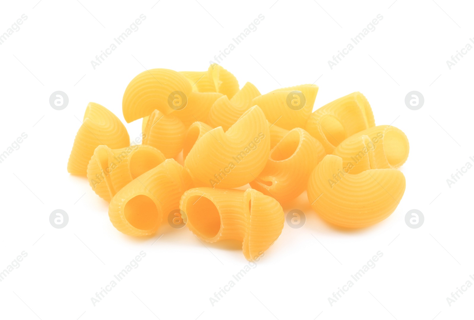 Photo of Pile of raw horns pasta isolated on white