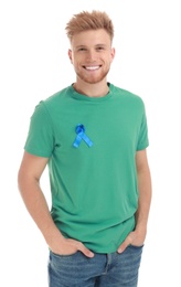 Young man with blue ribbon on white background. Urology cancer awareness