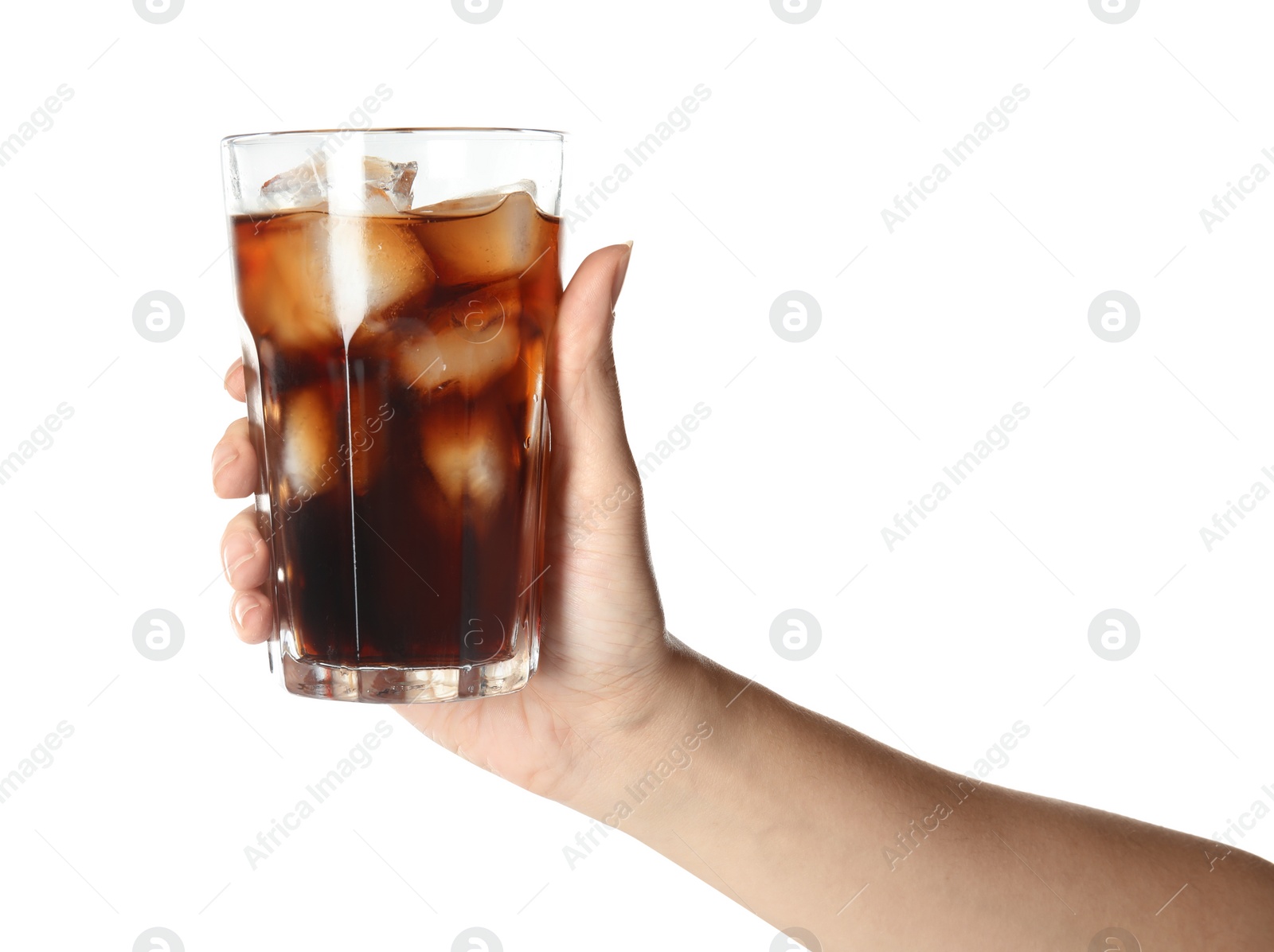 Photo of Woman holding glass of refreshing cola with ice on white background, closeup