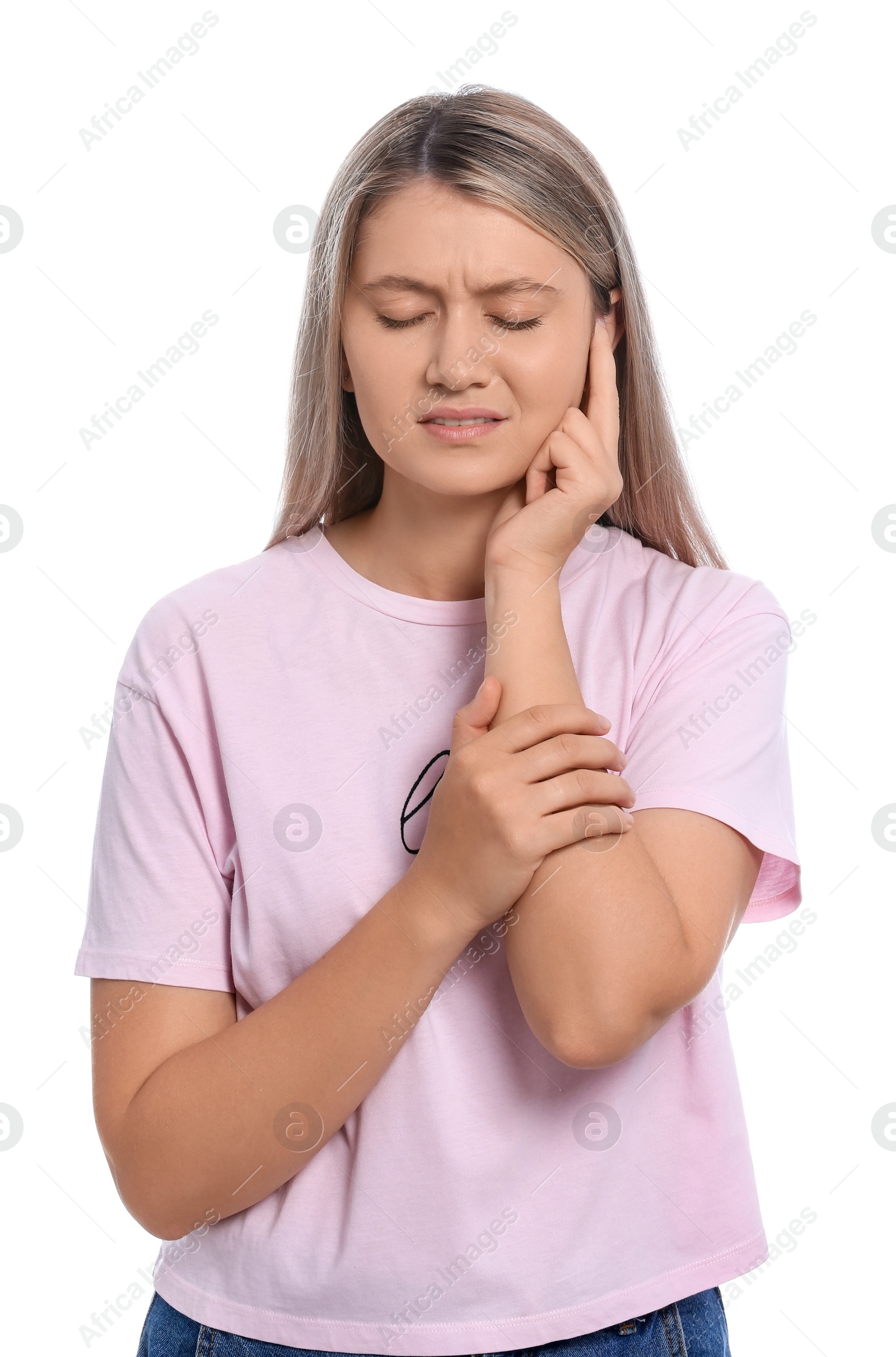 Photo of Young woman suffering from ear pain on white background