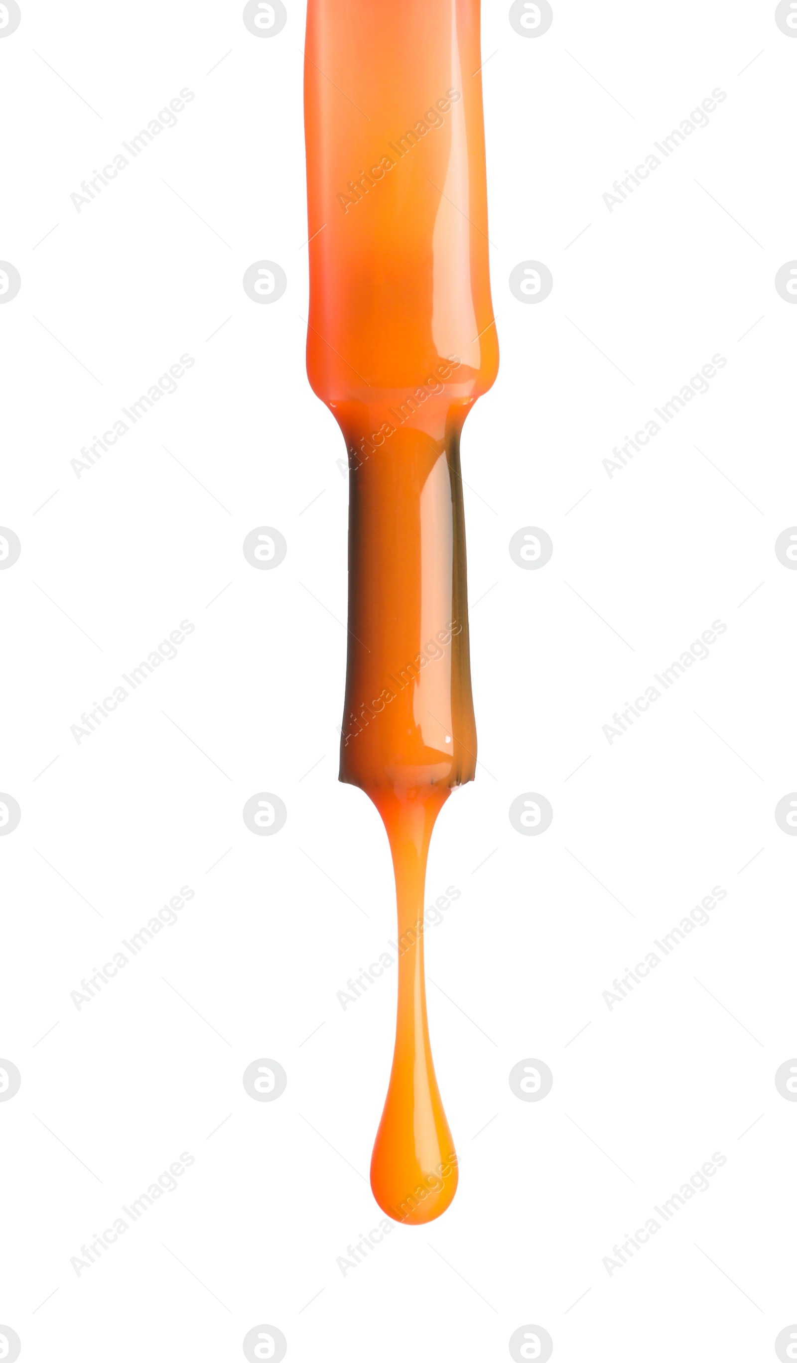 Photo of Orange nail polish dripping from brush isolated on white