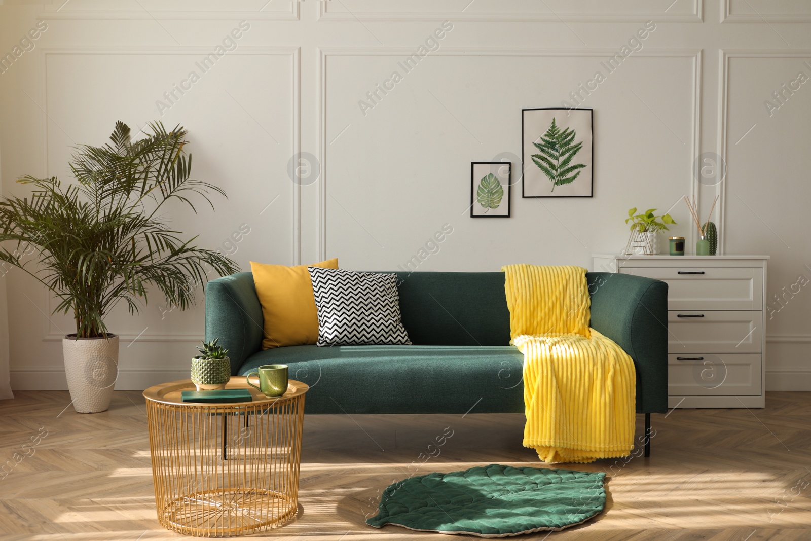 Photo of Stylish living room interior with comfortable green sofa