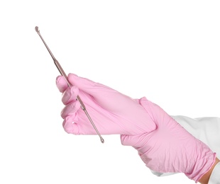 Photo of Doctor in sterile gloves holding medical instrument on white background
