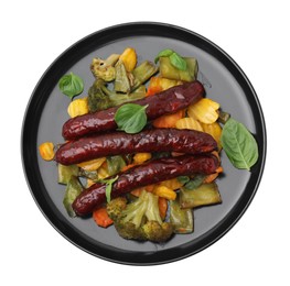 Delicious smoked sausages and baked vegetables isolated on white, top view
