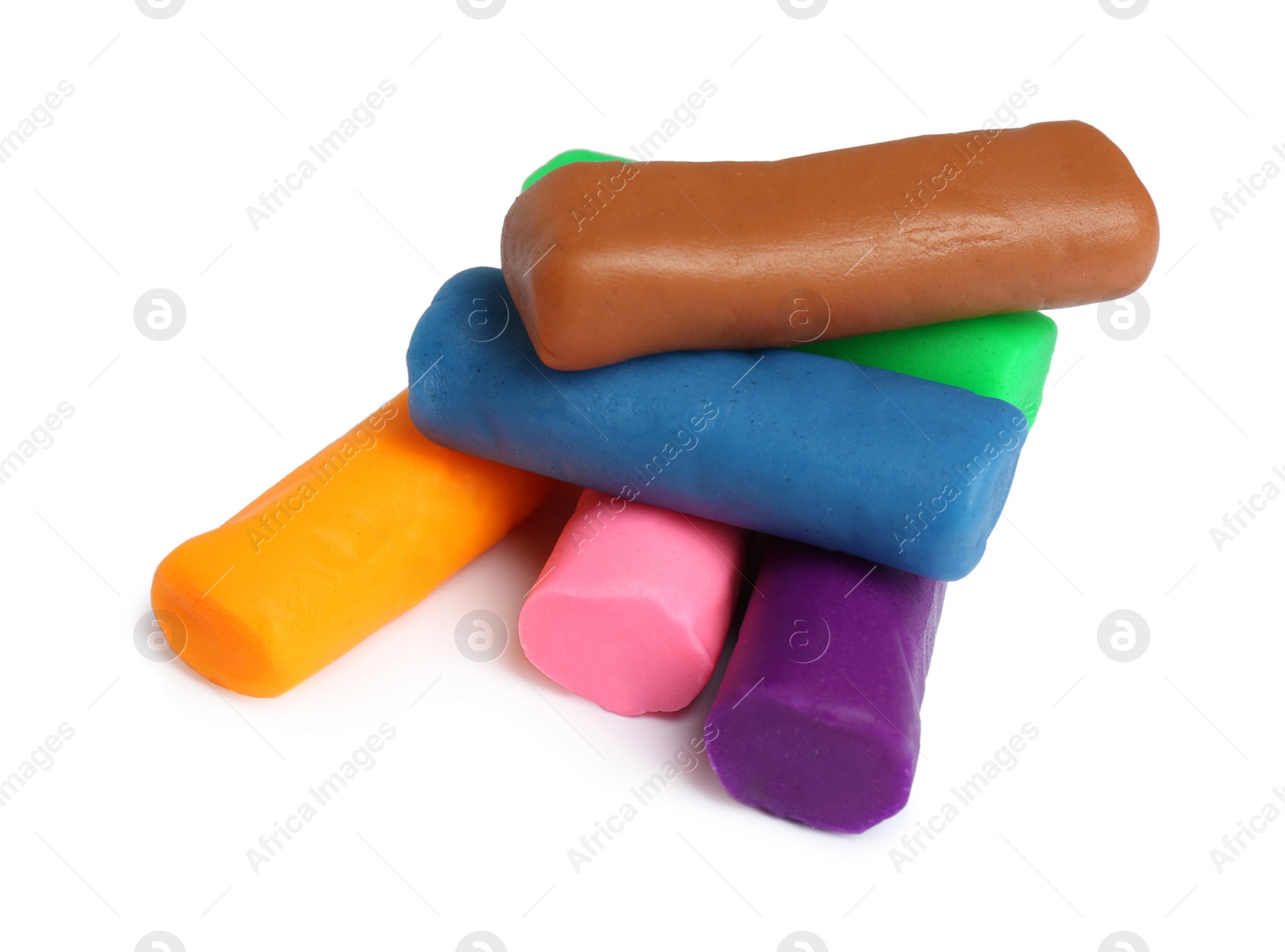 Photo of Different color play dough on white background