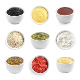 Image of Set of different delicious sauces and condiments on white background