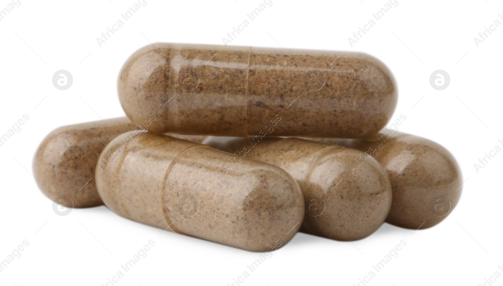 Photo of Pile of vitamin capsules isolated on white