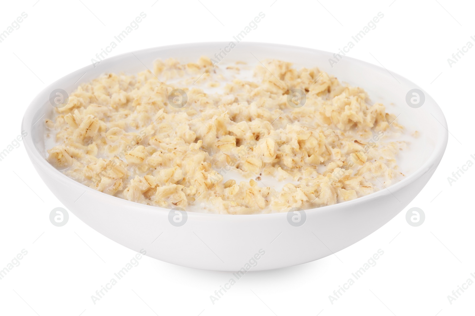 Photo of Tasty boiled oatmeal in bowl isolated on white