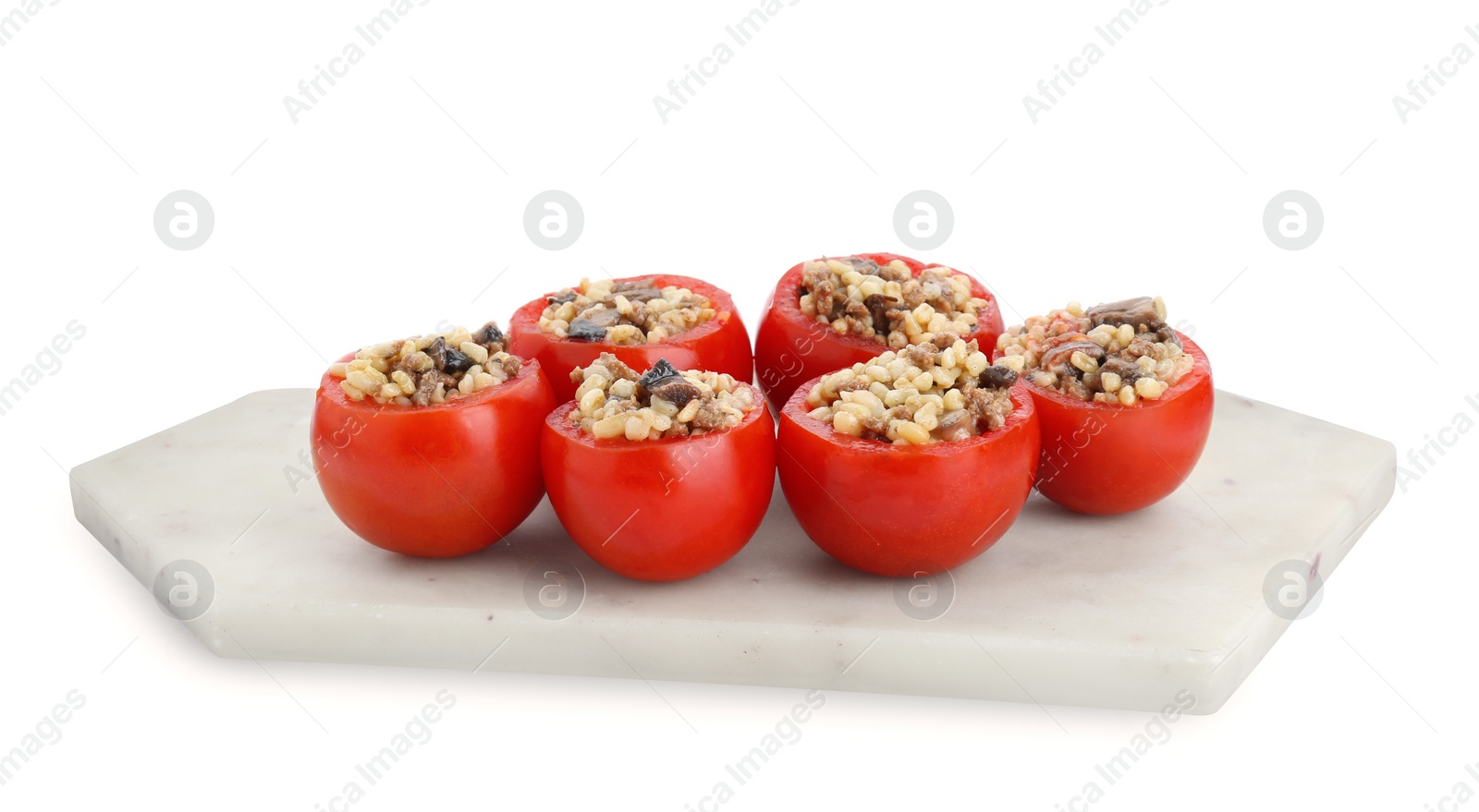 Photo of Delicious stuffed tomatoes with minced beef, bulgur and mushrooms isolated on white