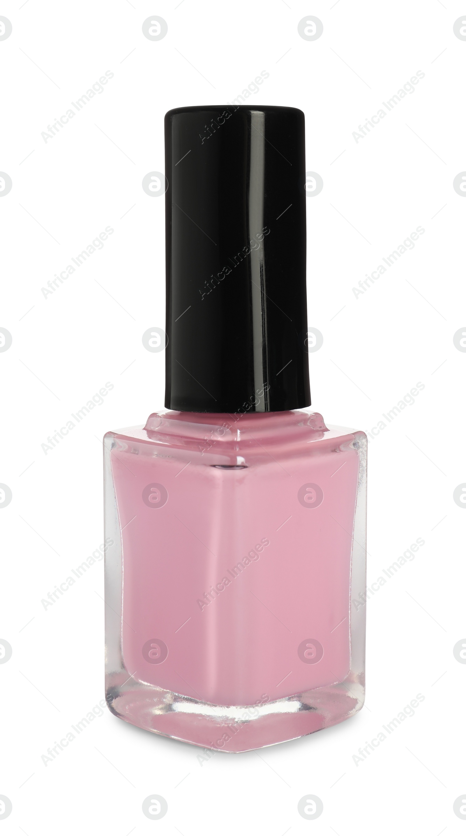 Photo of Pink nail polish in bottle isolated on white