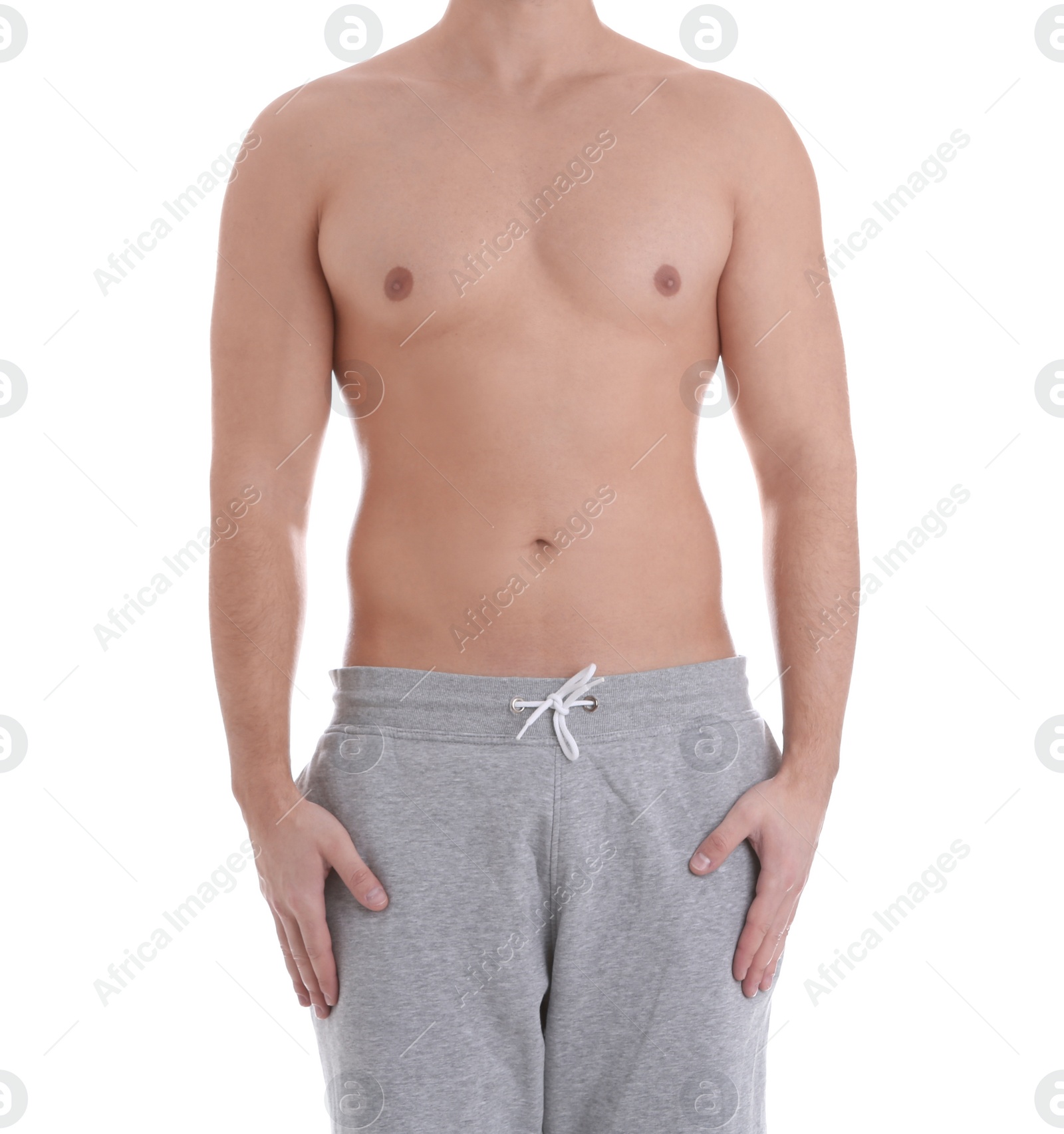 Photo of Young athletic man on white background, closeup. Weight loss