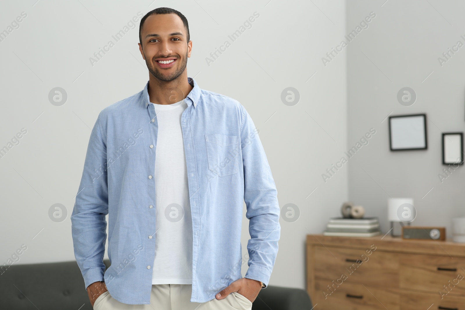 Photo of Portrait of handsome young man at home